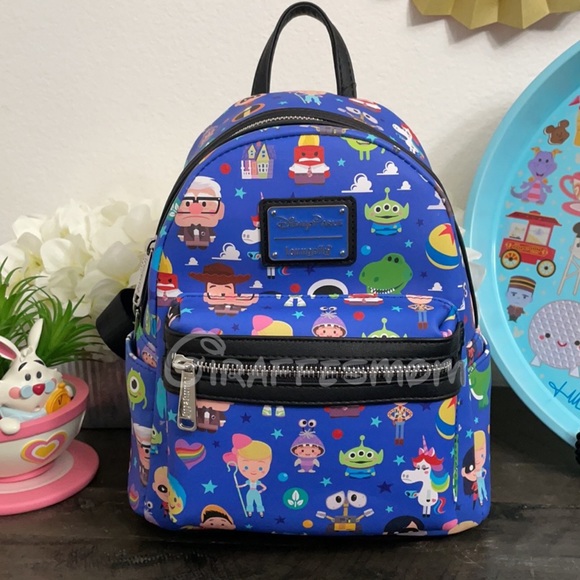 Disney | Bags | Disney World Of Pixar Loungefly Backpack | Poshmark